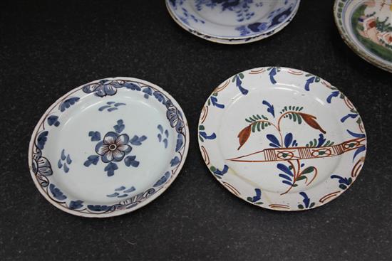 Seven English and Dutch delftware plates and dishes, c.1700-1760, 22 - 23cm, some damage